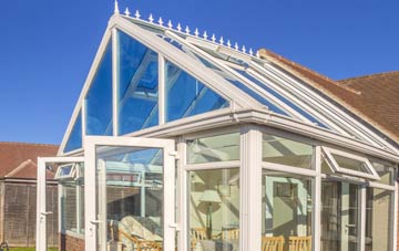 conservatory roof insulation costs John Ogaunts